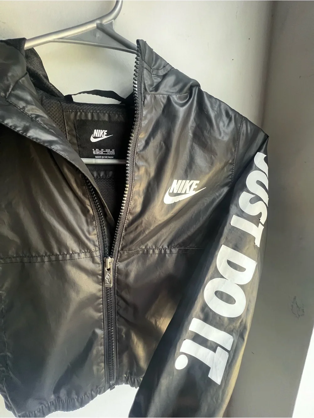 Nike Black Kids Hooded Rain Jacket with White Logo